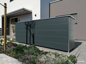 . Ein moderner Schuppen im Vorgarten eines Hauses mit Blumenbeet im Vordergrund.
