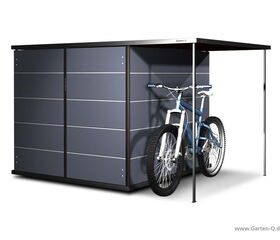 . Ein grauer Gartenschrank mit einem Fahrrad davor.