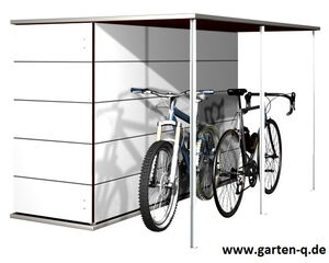 Ein weißer Fahrradunterstand mit zwei abgestellten Fahrrädern.