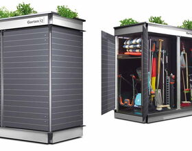 . The image shows an outdoor storage unit, likely for gardening tools. On the left, the unit is closed, while on the right, the doors are open, revealing various gardening tools and supplies inside, such as shovels, rakes, a hose, and other equipment. The top of the unit has plants growing on it.