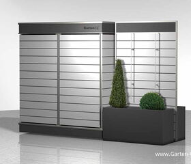 The image is a representation of a modern garden storage unit. It features sleek, horizontal slats in a metallic finish and includes integrated planters, housing two decorative plants—a tall, narrow one and a round, bushy one. The design appears modern and stylish, suitable for outdoor or garden use.