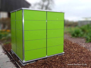. This image shows a green garden storage unit or shed, likely used for organizing garden tools and equipment. It's designed with a modern look, featuring clean lines and a minimalist aesthetic. The setting appears to be outdoors on a garden path.